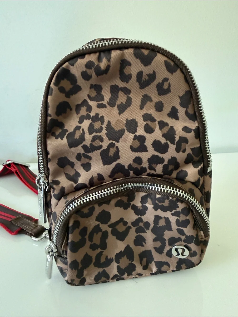lululemon athletica Leopard Print Crossbody Sling Bag with Red Strap